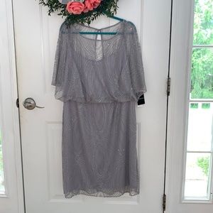 Beautiful special occasion silver dress. 16w